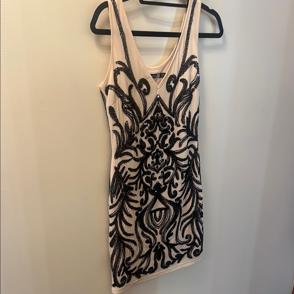 Elegant Black and Cream Embellished Dress